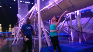 aki getting a lesson on proper "banana" form for swinging straight